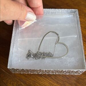 NWOT Large Heart Pendant Necklace Sideways Oversized Silver Color Beautiful